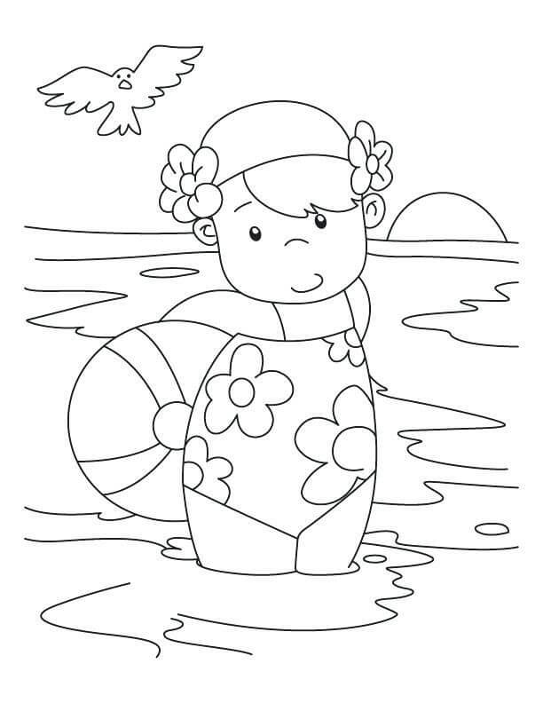 Pieni tyttö rannalla uimassa Värityskuva