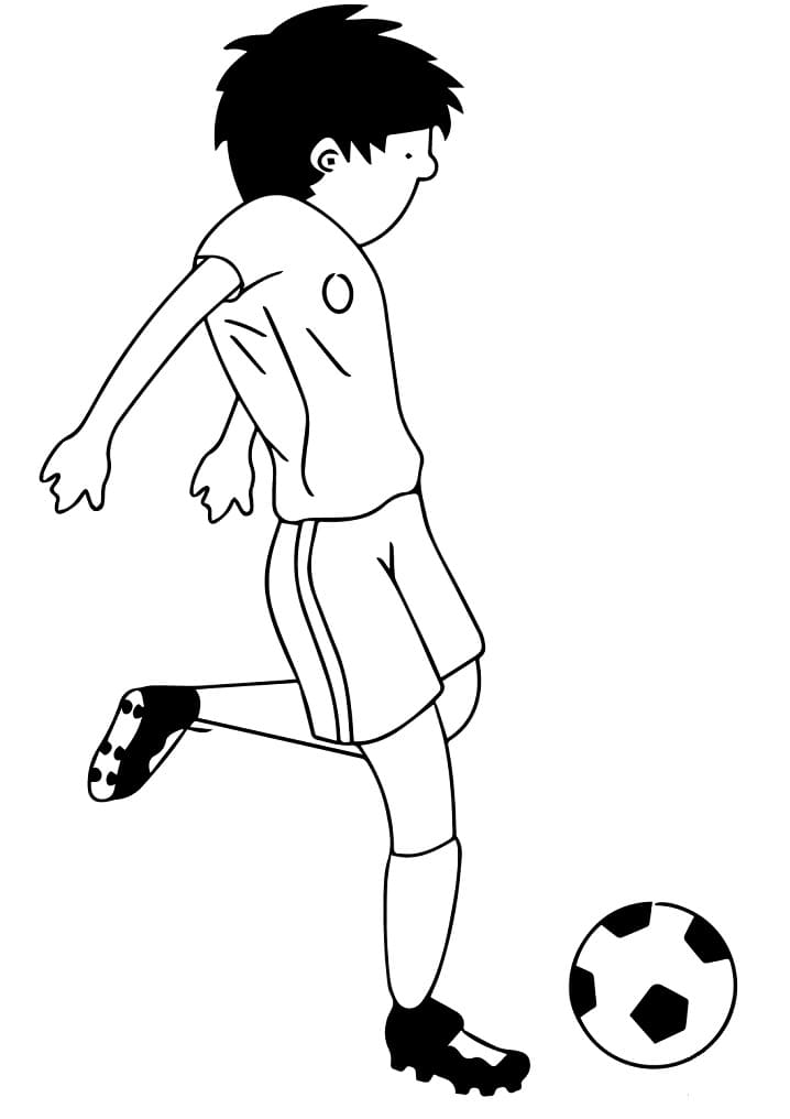 Jalkapalloa pelaava poika Värityskuva
